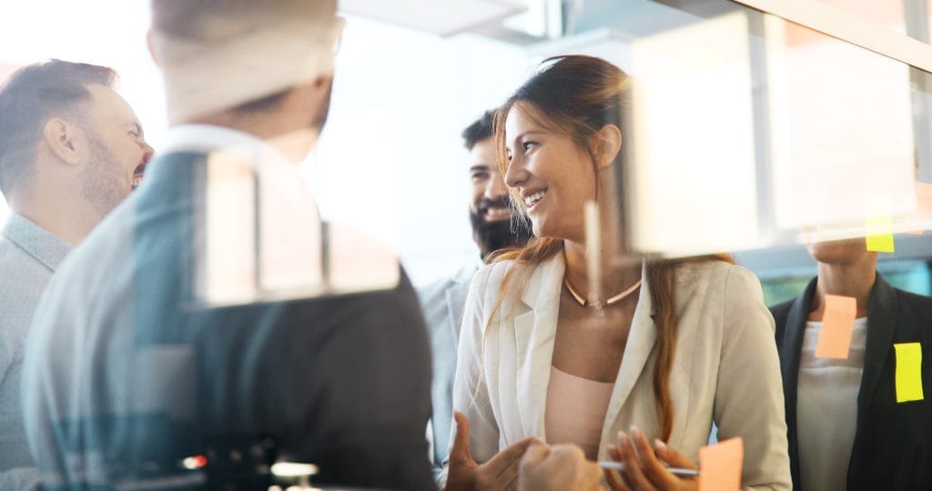Collaboration and analysis by business people working in a office