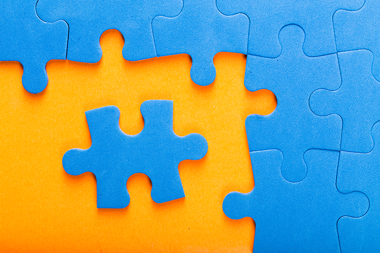 Puzzle shapes signifying the ability to connect high quality staffing prospects with companies that are in need.